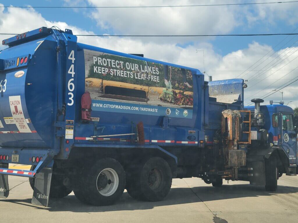 City of Madison truck with leaf-free streets information on the side