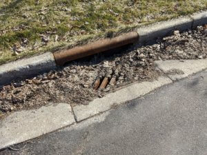 Storm drain and debris - springtime