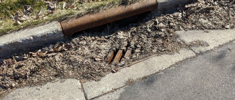 Storm drain and debris - springtime